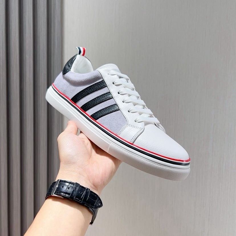Three-Stripe Color-Block Sneaker — Red & Black Sole Detail